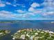 Scenic aerial view of waterfront properties nestled along the bay, complete with boat docks at 1389 Harbor Dr, Sarasota, FL 34239