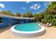 Private outdoor pool showcasing large pool, lounge chairs, and lush landscaping at 1389 Harbor Dr, Sarasota, FL 34239