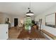 Open concept dining area with a view of the living room at 2018 Arden Dr, Sarasota, FL 34232