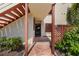 Condo entrance with terracotta-colored stairs and walkway at 530 Spring Lakes Blvd, Bradenton, FL 34210