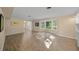 Living room featuring hardwood floors and bay windows at 3556 E Forest Lake Dr, Sarasota, FL 34232