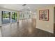 Bright dining room with sliding glass doors leading to a patio at 3556 E Forest Lake Dr, Sarasota, FL 34232