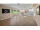 Living room with hardwood floors, built-ins and bay window at 3556 E Forest Lake Dr, Sarasota, FL 34232