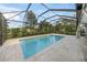 Inviting, refreshing pool with a screened enclosure, perfect for relaxing at 3556 E Forest Lake Dr, Sarasota, FL 34232