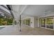 Covered patio overlooking a refreshing pool at 3556 E Forest Lake Dr, Sarasota, FL 34232