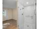 Clean bathroom with a walk-in shower and subway tile at 3556 E Forest Lake Dr, Sarasota, FL 34232