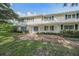 Charming two-story home with a stone walkway at 3556 E Forest Lake Dr, Sarasota, FL 34232