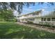 Ranch style home with stone walkway and landscaping at 3556 E Forest Lake Dr, Sarasota, FL 34232
