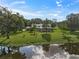 Lakefront property with large backyard and home at 3556 E Forest Lake Dr, Sarasota, FL 34232