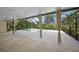 Relaxing pool area with covered patio and screened enclosure at 3556 E Forest Lake Dr, Sarasota, FL 34232