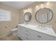 Modern bathroom with a double vanity and updated fixtures at 3556 E Forest Lake Dr, Sarasota, FL 34232