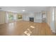 Living area with hardwood floors, fireplace and built-ins at 3556 E Forest Lake Dr, Sarasota, FL 34232