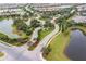 Aerial view of community entrance and landscaping at 5435 Lago Maggio St, Sarasota, FL 34238