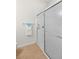 Clean shower with glass enclosure and tiled walls at 13180 Ipolita St, Venice, FL 34293