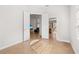 Open hallway view with access to living room and kitchen areas at 13180 Ipolita St, Venice, FL 34293