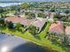 Aerial view highlighting the home's private backyard and water access at 13180 Ipolita St, Venice, FL 34293