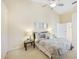 Spacious bedroom with vaulted ceiling and neutral decor at 4995 Pepperwood Pl, Venice, FL 34293