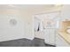White kitchen cabinets and granite countertops at 4995 Pepperwood Pl, Venice, FL 34293