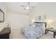 Main bedroom with high ceilings, large closet, and ceiling fan at 4995 Pepperwood Pl, Venice, FL 34293