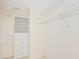 Large walk-in closet with shelving and drawers at 4995 Pepperwood Pl, Venice, FL 34293
