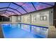 Inviting pool and patio area with a covered lanai, perfect for entertaining at 45 Bunker Ln, Rotonda West, FL 33947
