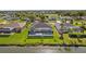 Aerial view of a canal-front home with private pool at 45 Bunker Ln, Rotonda West, FL 33947