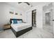 Guest bedroom with a queen bed and large closet at 45 Bunker Ln, Rotonda West, FL 33947