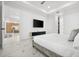 Main bedroom with marble floors and access to the kitchen at 45 Bunker Ln, Rotonda West, FL 33947