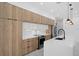 Modern kitchen with stainless steel appliances and a large island at 45 Bunker Ln, Rotonda West, FL 33947