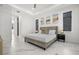 Spacious bedroom with plush carpet and large window at 45 Bunker Ln, Rotonda West, FL 33947