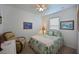 Guest bedroom with ceiling fan and window coverings at 12271 Lavender Loop, Bradenton, FL 34212