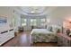 Spacious primary bedroom with hardwood floors and ample natural light at 12271 Lavender Loop, Bradenton, FL 34212