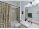 Guest bathroom with tub shower combo and vanity at 12271 Lavender Loop, Bradenton, FL 34212