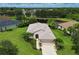 Single story home on a corner lot with mature landscaping at 12271 Lavender Loop, Bradenton, FL 34212