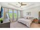 Spacious main bedroom with a king-size bed and plenty of natural light at 5474 Summit Gln, Bradenton, FL 34203