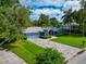 Single-story home with a two-car garage and a well-manicured lawn at 1389 Harbor Dr, Sarasota, FL 34239