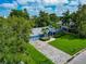 Single story home with a large backyard and paver driveway offering ample space and curb appeal at 1389 Harbor Dr, Sarasota, FL 34239