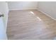 Bedroom showcasing wood-look floors and neutral wall color at 4973 Village Gardens Dr # 50, Sarasota, FL 34234