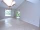 Bright dining area with tile floors and mirrored wall at 4973 Village Gardens Dr # 50, Sarasota, FL 34234