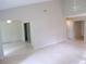 Large living room with high ceilings and tiled floors at 4973 Village Gardens Dr # 50, Sarasota, FL 34234