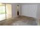 Spacious bedroom with large closet and view of sunroom at 4973 Village Gardens Dr # 50, Sarasota, FL 34234