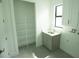 Laundry room with utility sink, shelving and cabinets at 1094 Rotonda Cir, Rotonda West, FL 33947