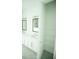 Bright bathroom boasts double sinks, and a large walk-in shower at 1094 Rotonda Cir, Rotonda West, FL 33947