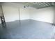 Spacious garage with epoxy flooring at 1094 Rotonda Cir, Rotonda West, FL 33947