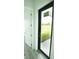 Glass door leading to backyard patio at 1094 Rotonda Cir, Rotonda West, FL 33947