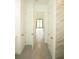 Bright hallway with doors leading to other rooms at 1094 Rotonda Cir, Rotonda West, FL 33947