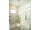 Bathroom with marble shower and modern vanity at 1094 Rotonda Cir, Rotonda West, FL 33947