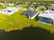 Lakefront community with several modern homes at 1094 Rotonda Cir, Rotonda West, FL 33947