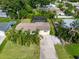 Single-story house with a fenced-in pool and large yard at 521 Live Oak St, Venice, FL 34285