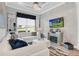 Bright living room with white sectional sofa and fireplace at 4507 Terrazza Ct, Bradenton, FL 34211